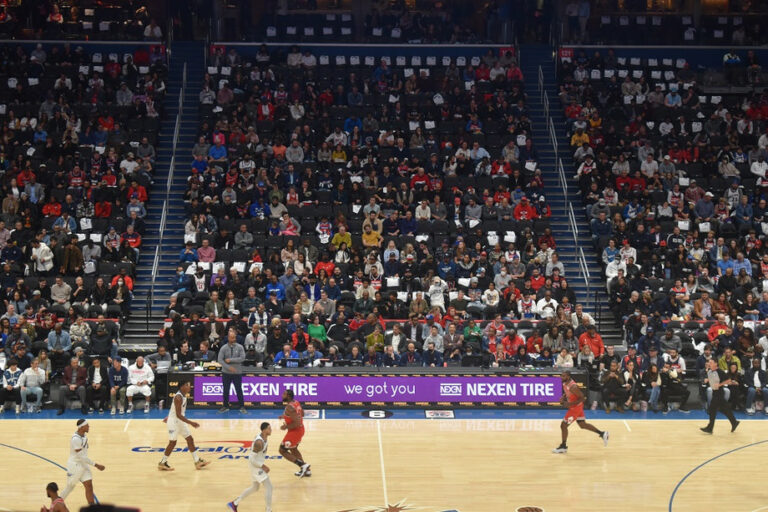 NEXEN logo in background of basketball court during a game